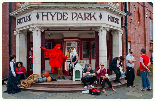 Salt Song (1) performers taking a break from rehearsals at Hyde Park Picture House, Leeds, September 2013. Photo by Lizzie Coombes for Imove, 2013.