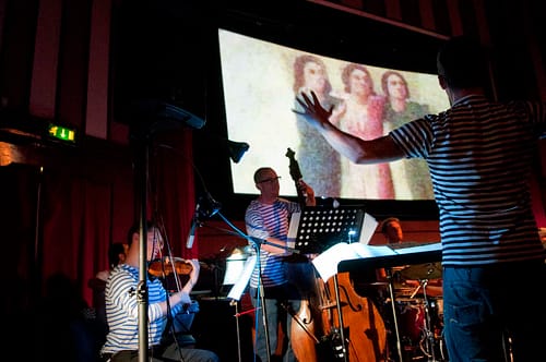 Dave Kane conducting for Salt Song at Hyde Park Picture House 5 September 2013. Photo by Lizzie Coombes for Imove.