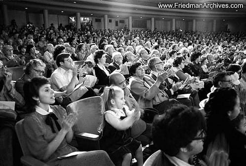 Girl clapping in audience 8x12 300 dpi