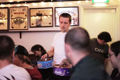 Rich Milner handing out free cake at Square Hole