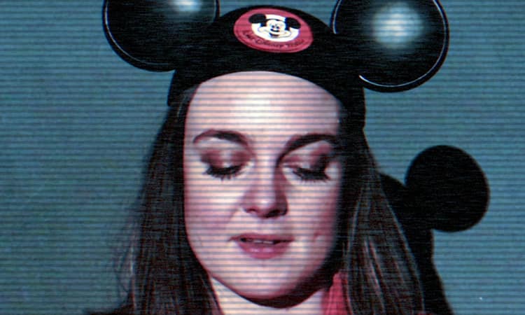 Lydia Cottrell in a Mickey Mouse hat