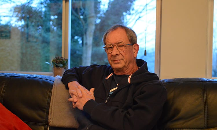 Author Chris Nickson relaxing on a couch at home