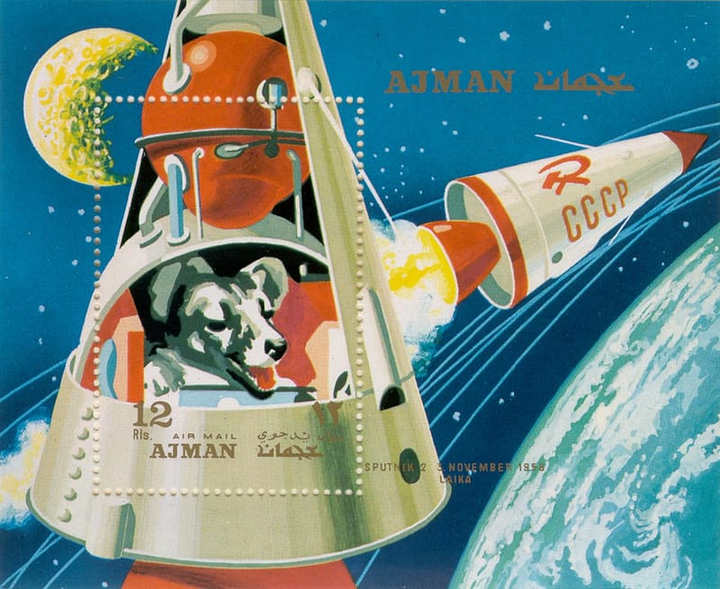 Postage stamp of Laika in space.